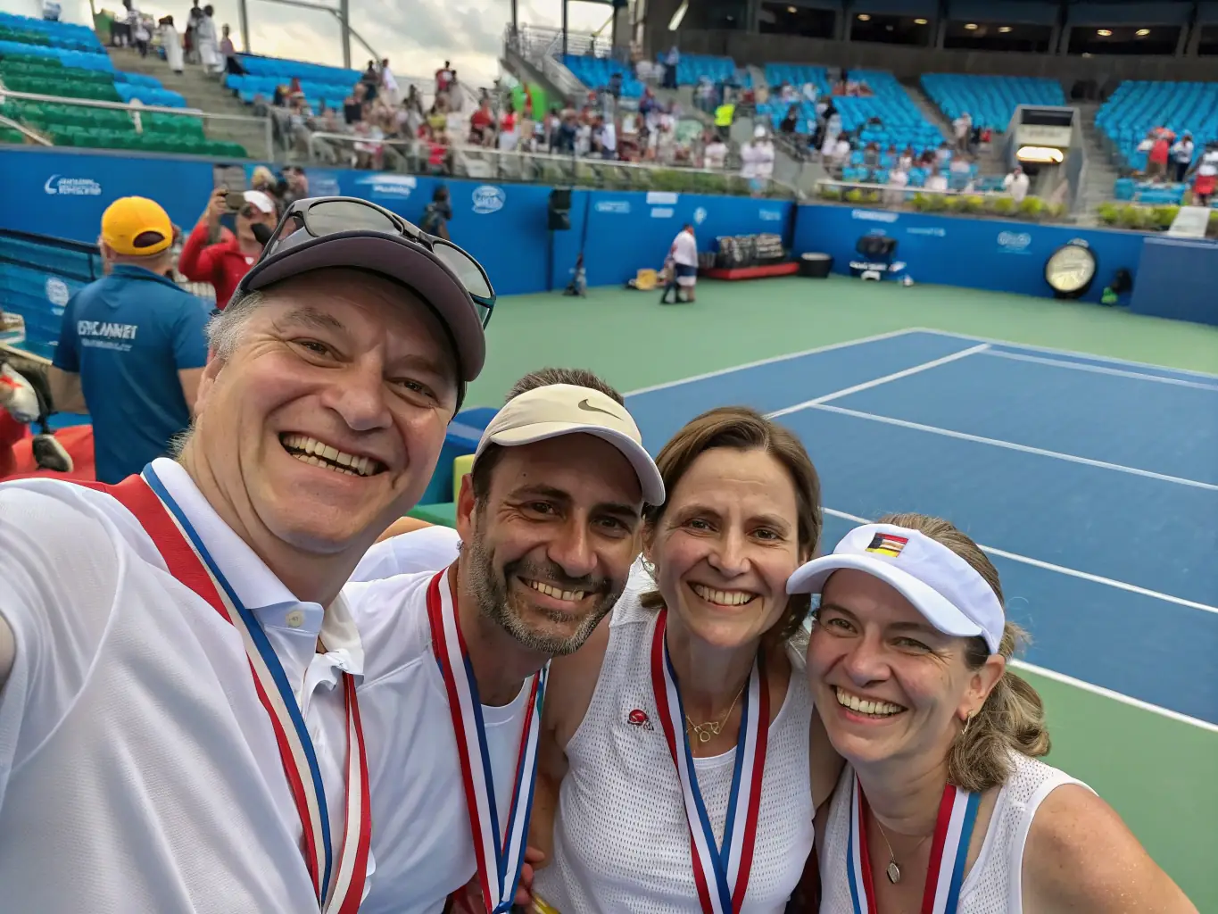 A young tennis player receiving a medal at a local tournament, with proud parents and coaches in the background. The image captures the spirit of competition and achievement within the club.